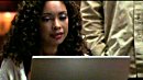 Jasmine watches a vid file of herself