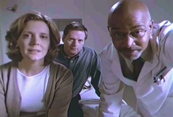 Dawn, Hank and the Doctor look at Buffy