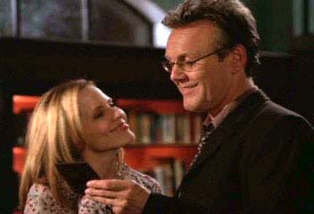 Giles and Anya together in the Magic Box